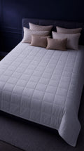 Zleepy Weighted Blanket spread on a bed